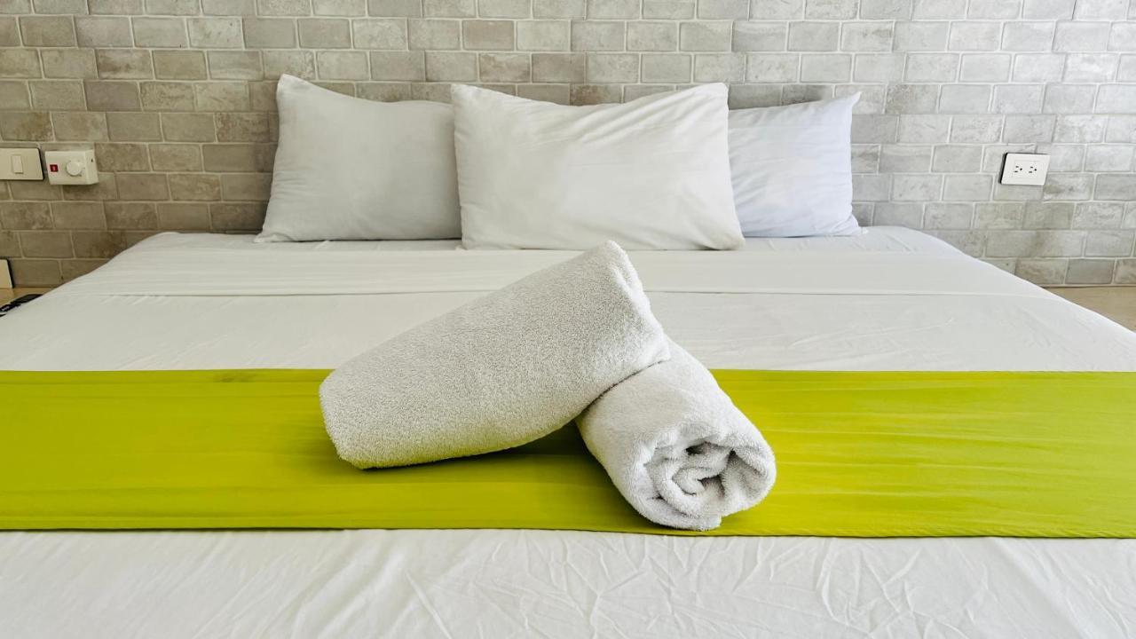 Hotel Mayari Holbox Kültér fotó Bath towels on a bed